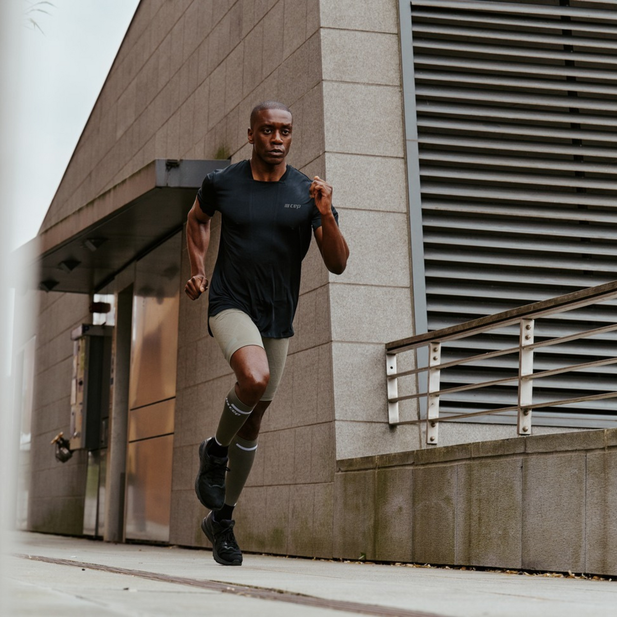 The Run Compression Tall Socks 4.0, Men, Olive/Black, close-up detail