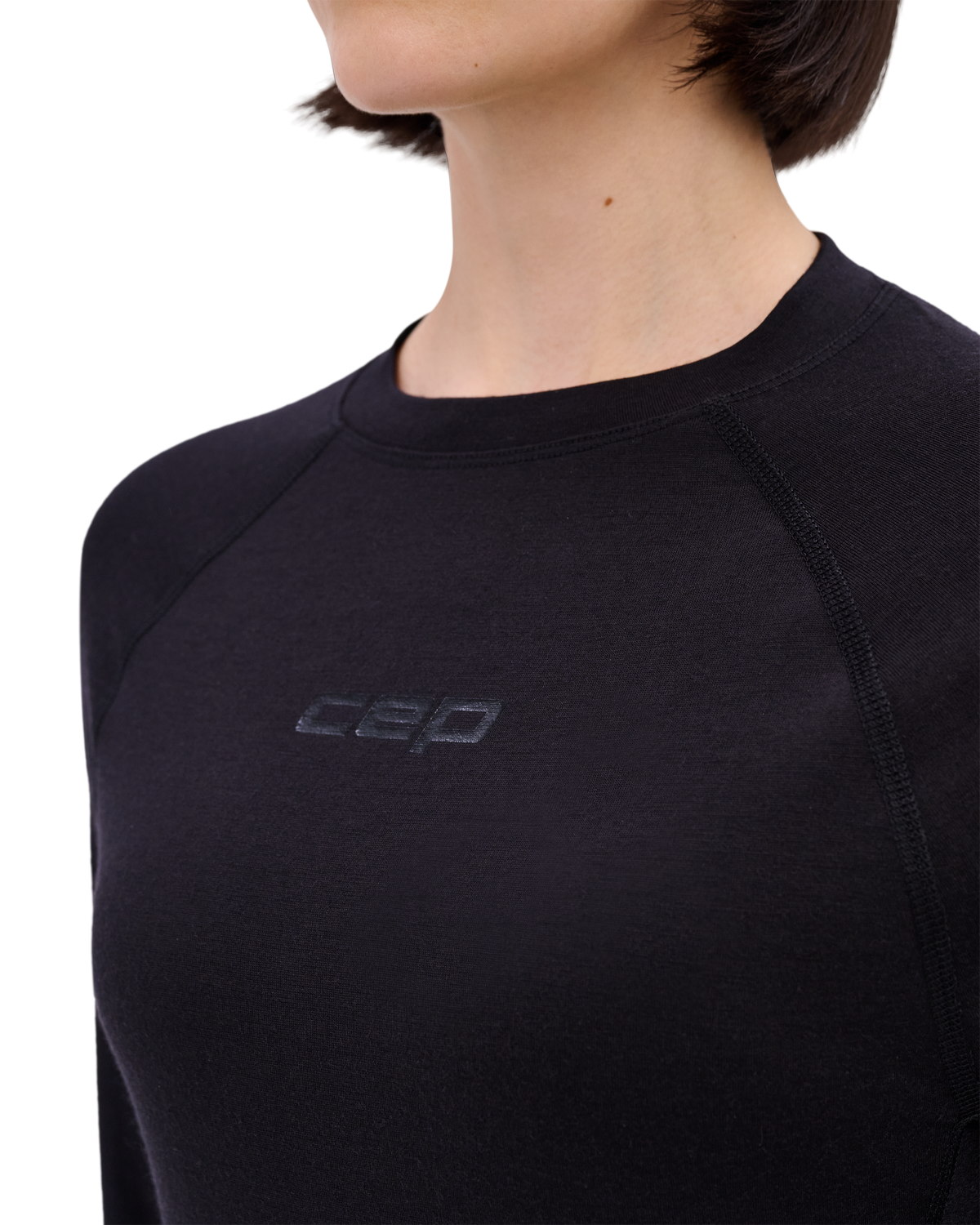 Core Run Merino Long Sleeve Base Shirt, Women, Black, close-up detail