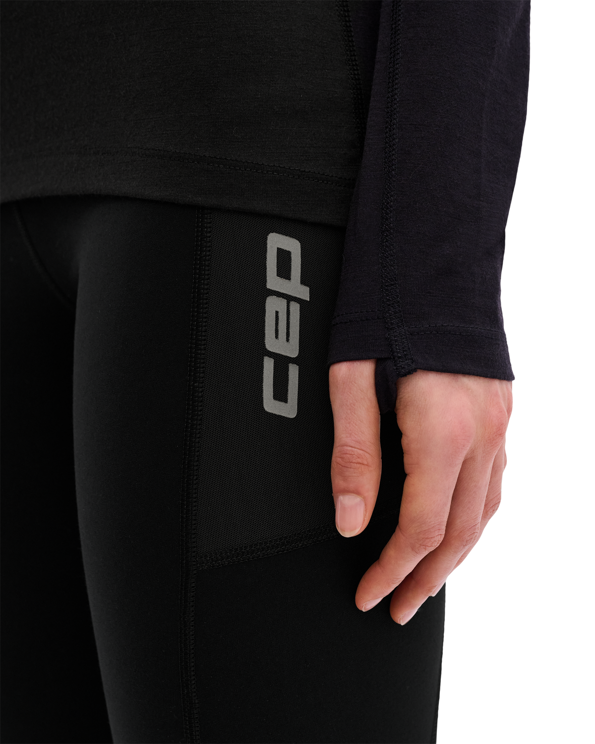 Core Run Merino Long Sleeve Base Shirt, Women, Black, close-up detail