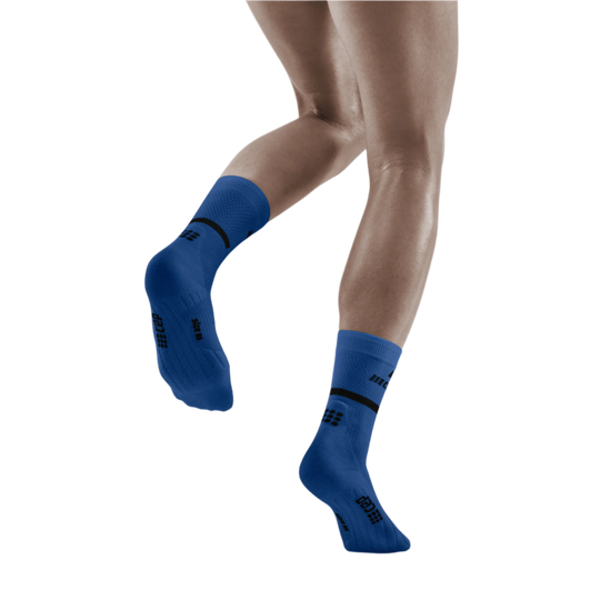 The Run Compression Mid Cut Socks 4.0, Women, Blue/Black, Back View Model