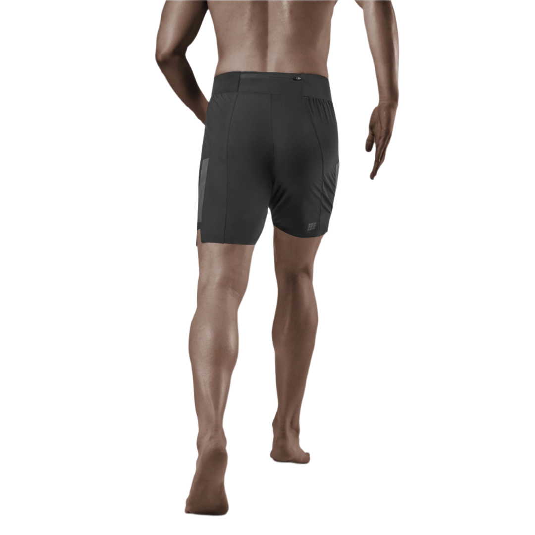 Run Loose Fit Shorts, Men, Black, Back View Model