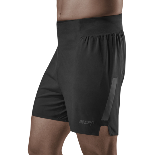 Run Loose Fit Shorts, Men, Black, Side View Model